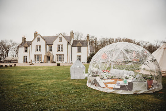 Igloo in front of exterior of Stemster House