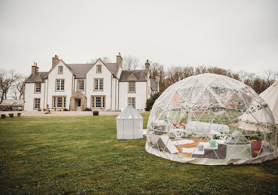 Igloo in front of exterior of Stemster House