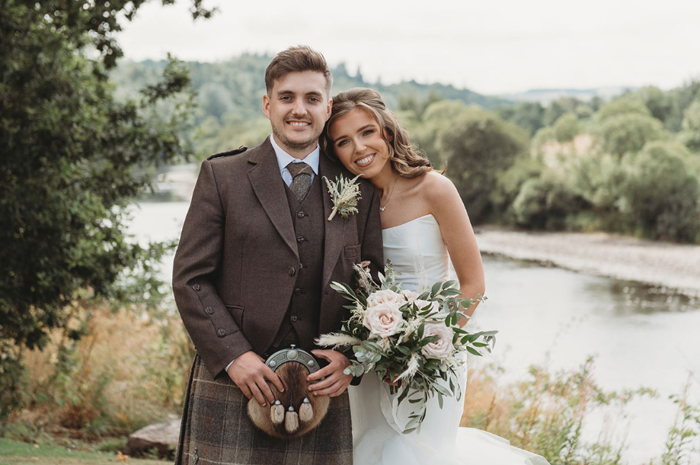 Couple portrait in front of loch