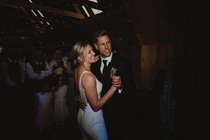 A Bride And Groom Dancing