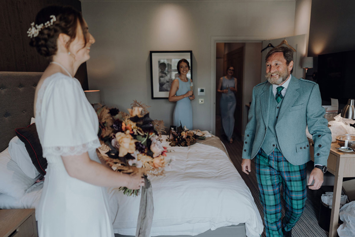 First look with the bride and her father on the wedding morning