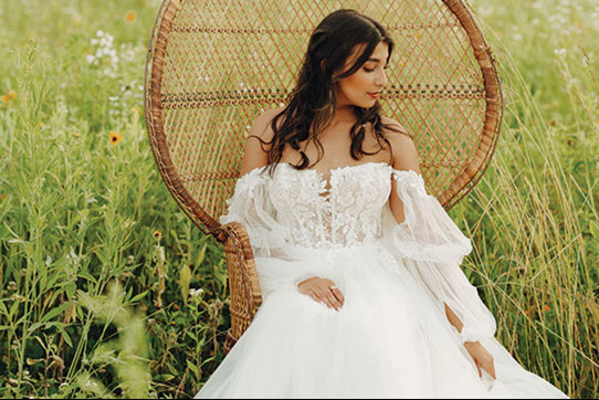 Boho A-line wedding dress with off-the-shoulder sleeves by Stella York