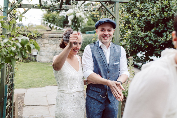 Bride and groom during outdoor ceremony