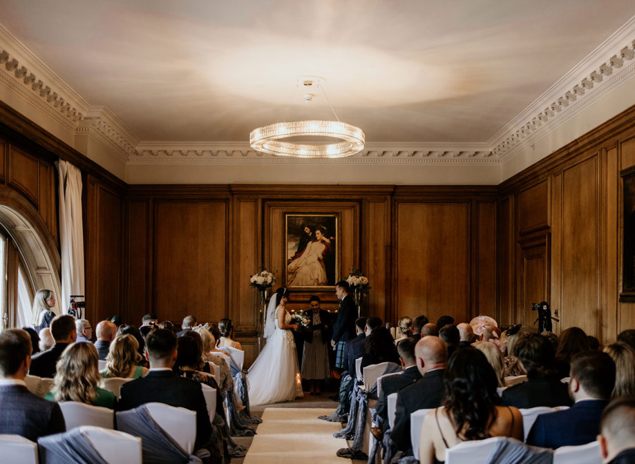 Couple and guests at the wedding ceremony