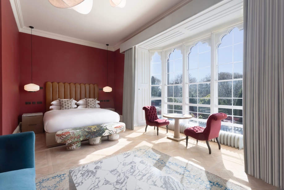 a new junior suite at mar hall that shows a grand view out to the gardens