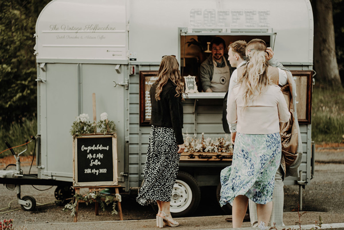 Guests wait at food truck