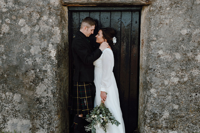 Bride and groom pose for their couple portraits