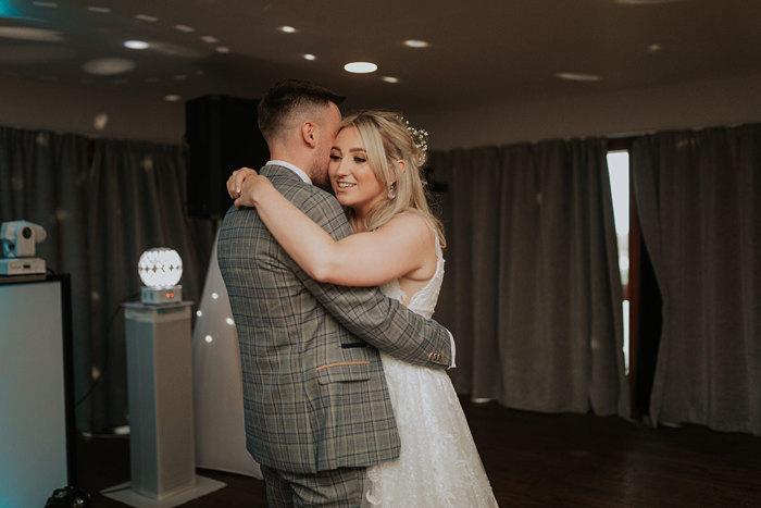 A Bride And Groom Hugging On The Dancefloor At Forbes Of Kingennie