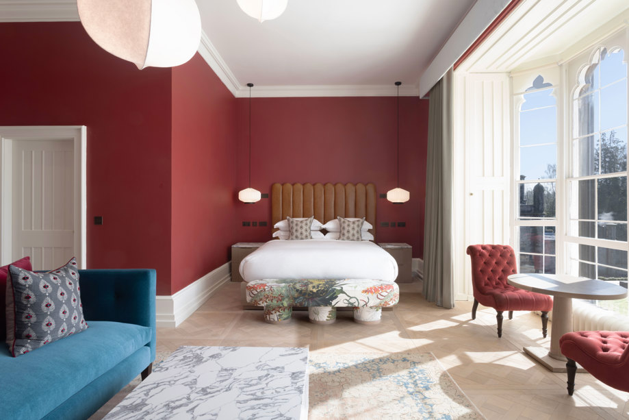 junior suite at mar hall with large bed and couch