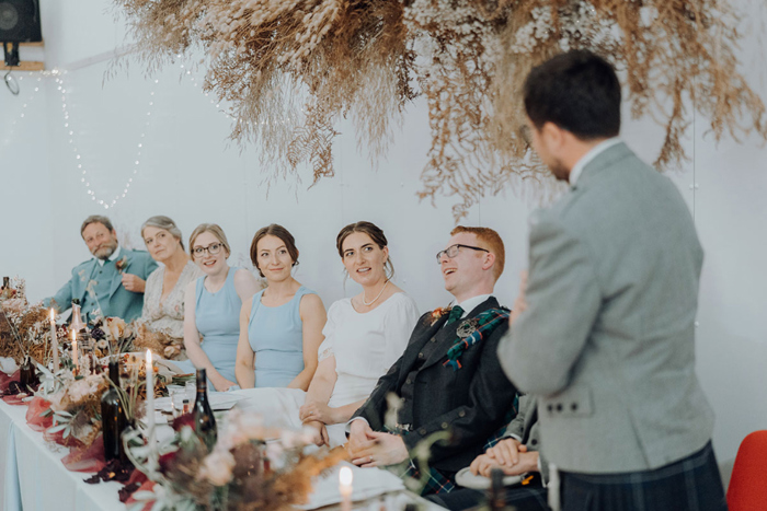 Groomsman gives speech during the wedding