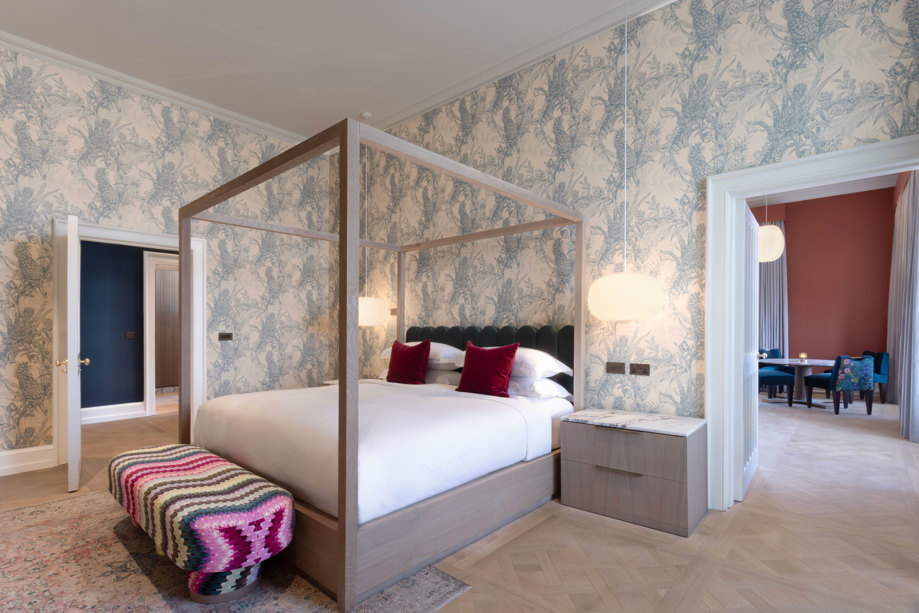 a grand suite bedroom at mar hall with a four poster bed