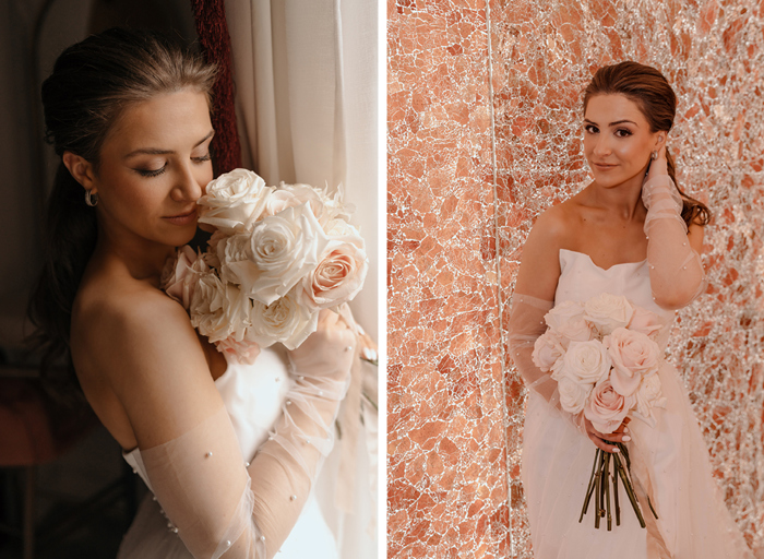 A bride poses in a short white dress with a white bouquet from The Petal Studio