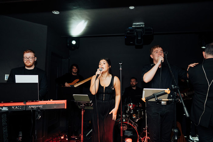 a wedding band performing on the stage at Seamill Hydro