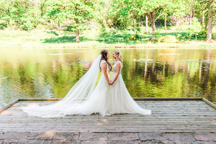 Couple portraits in front of water