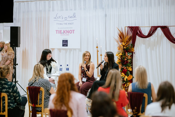 people watching the Let's Talk Tying the Knot stage at the Scottish Wedding Show