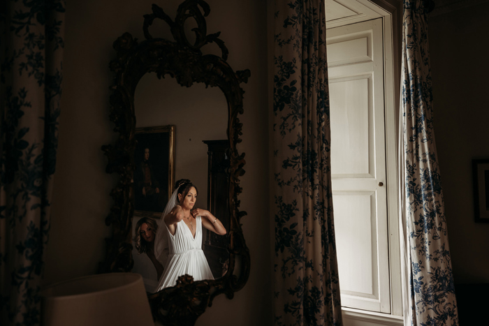 Reflection Of A Bride In A Mirror