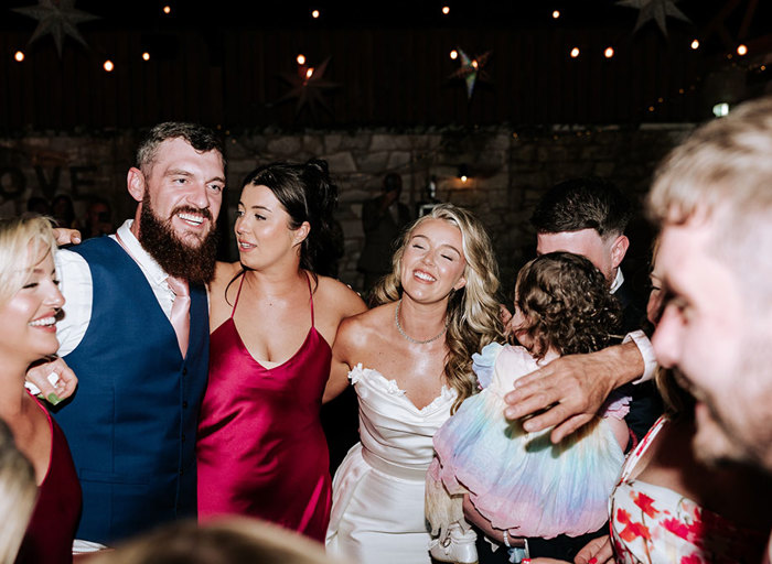 people dancing at a wedding