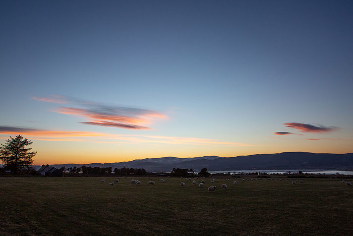 Sunset over highland fields