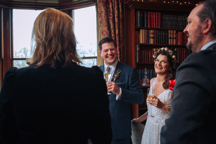 Bride and groom laugh during their wedding ceremony