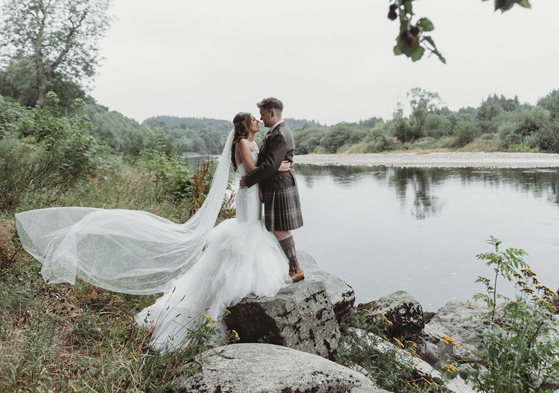 Couple portraits in front of loch