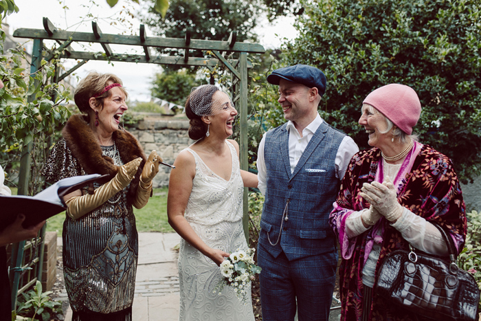 Bride, groom and guests during the ceremony