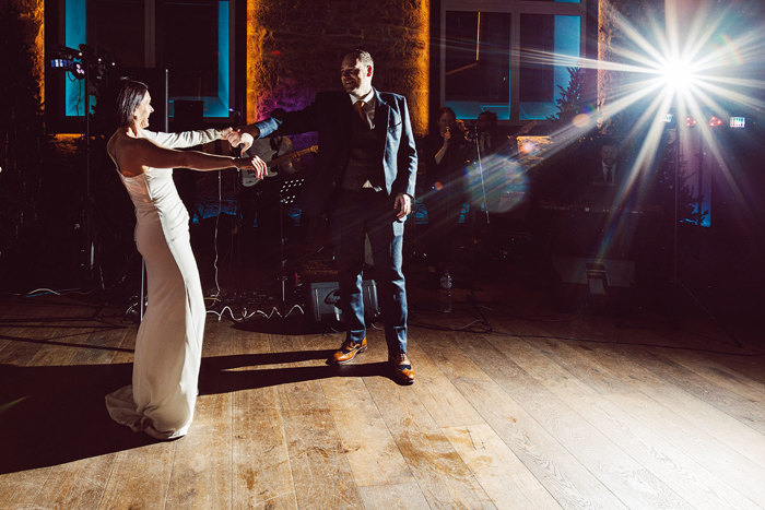 Bride and groom on their wedding night dancing 