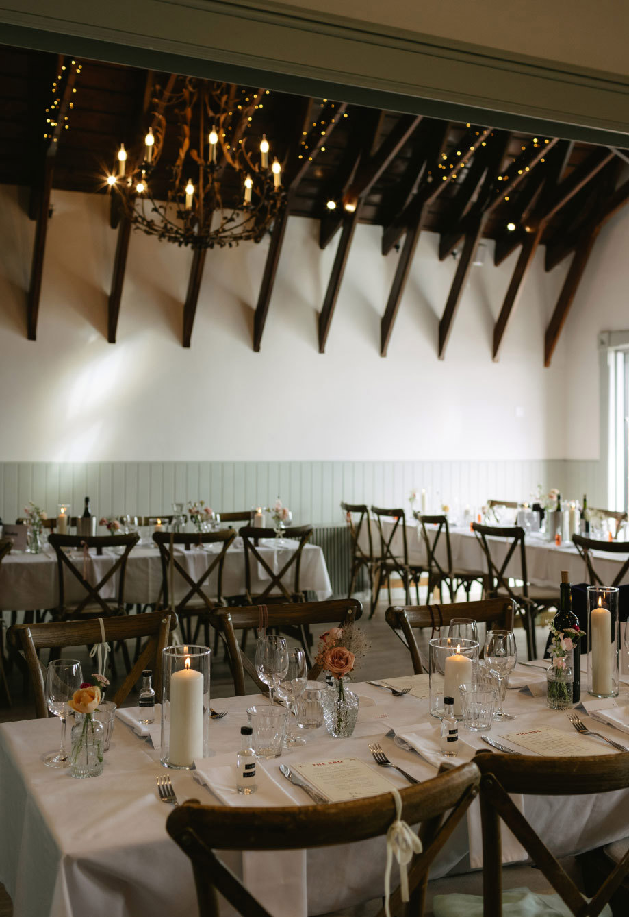 Interior Dougarie Boathouse set for wedding dinner