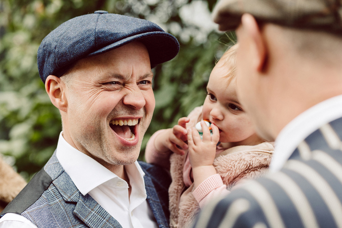 Groom and daughter during ceremony