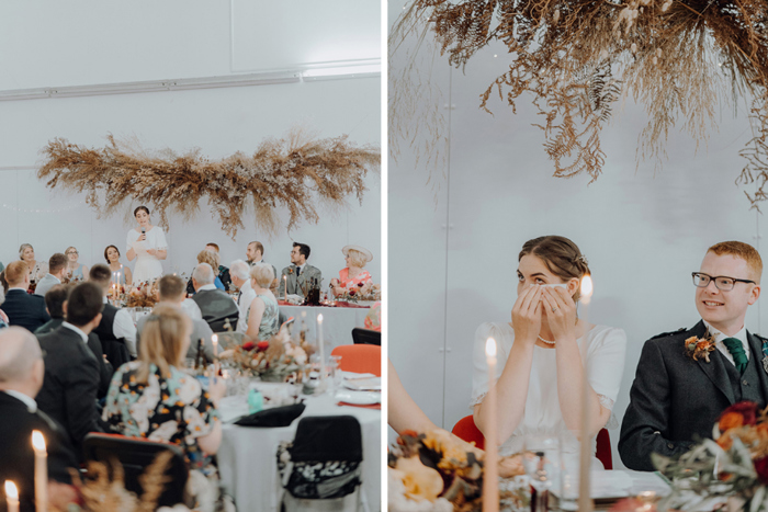 Bride giving speech and crying during other speeches at wedding breakfast