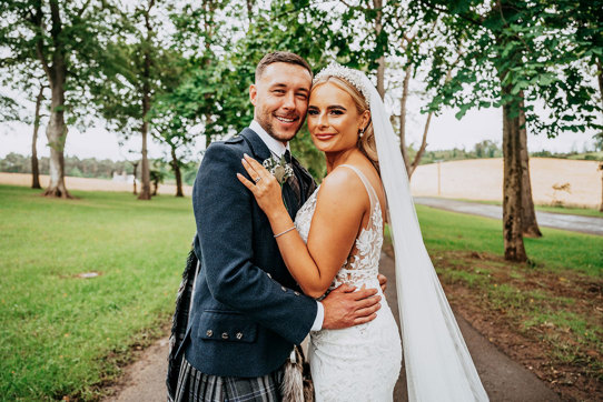 Bride And Groom In Garden At Enterkine House