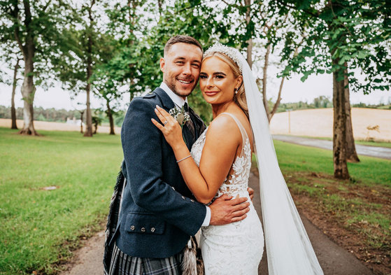 Bride And Groom In Garden At Enterkine House