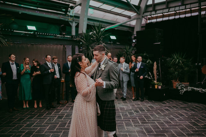 Bride and groom have their first dance