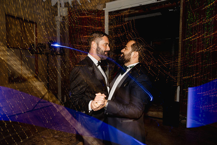 Image of grooms on the dancefloor