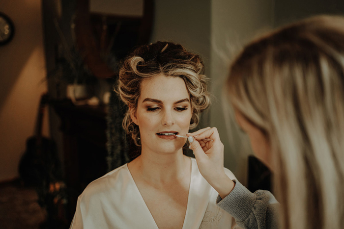 Bride having her makeup done