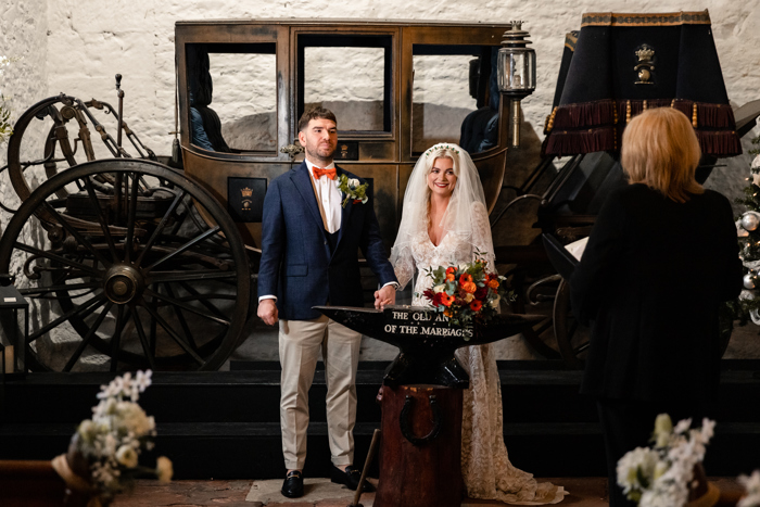 bride and groom say their vows during intimate ceremony at gretna green