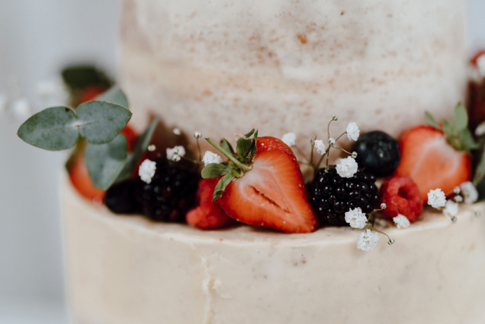 Close up of cake with fresh fruit on it