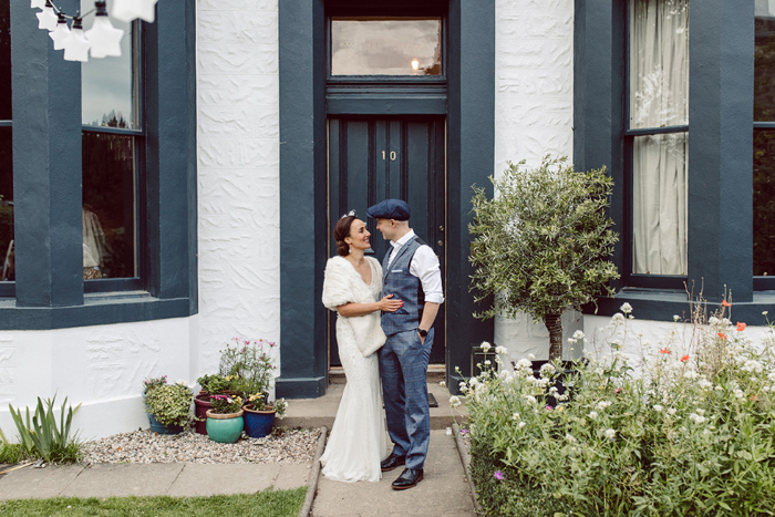 Couple portraits outside Edinburgh home