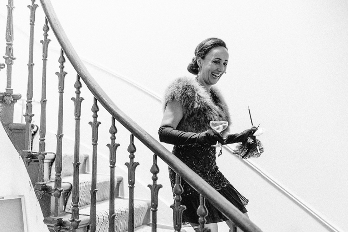 Bride Wearing Art Deco Clothing Walking Down Stairs