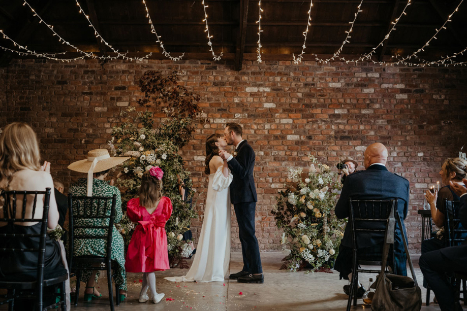 Couple kiss at the end of the ceremony