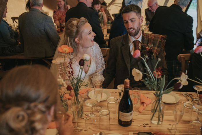 Candid image of the couple laughing