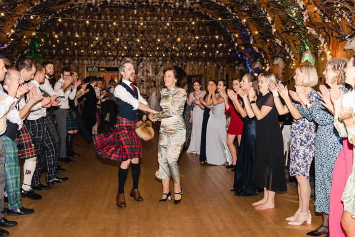 Guests ceilidh dance during the evening