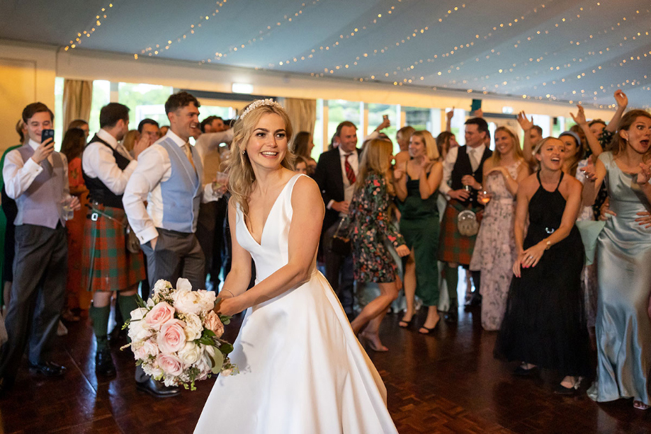 Bride preparing to throw the bouquet