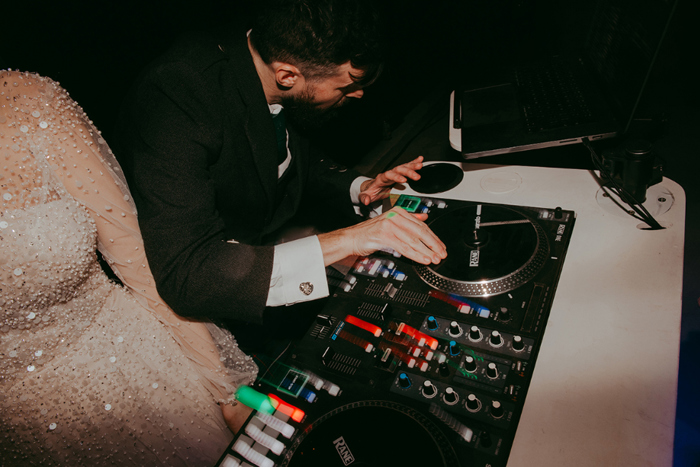 Bride and groom have a DJ battle