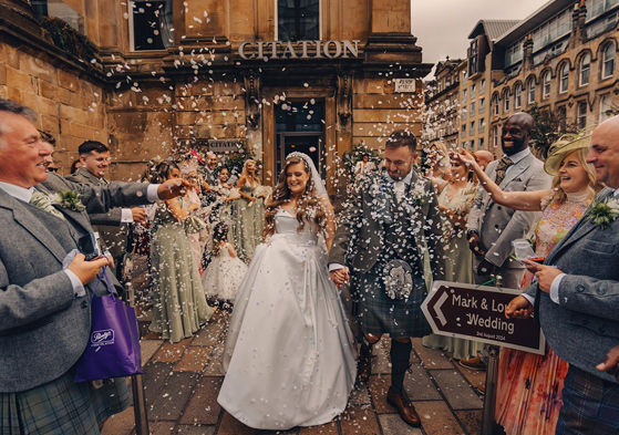 Confetti shot with crowd walking through