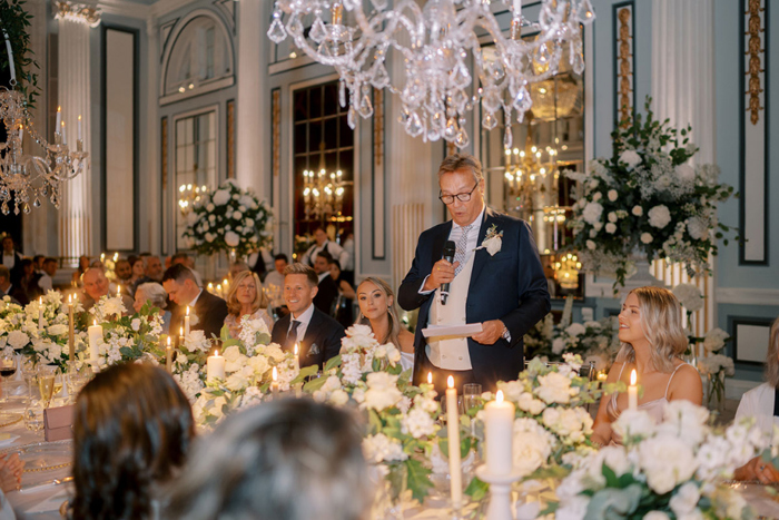 Bride's father gives a speech during reception