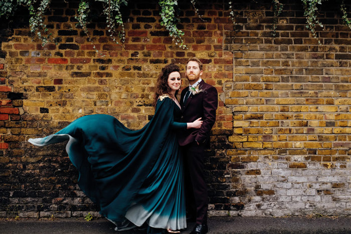 Revelry Events’ couple Tom and Eliana, with the bride in her handmade, dip-dyed teal gown and cape, stealing the show! (Photo: mariannechua.com)