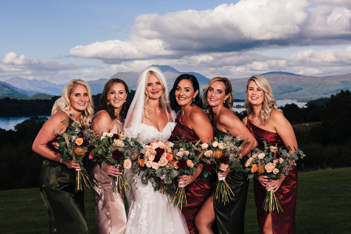 Bride and bridesmaids holding bouquets