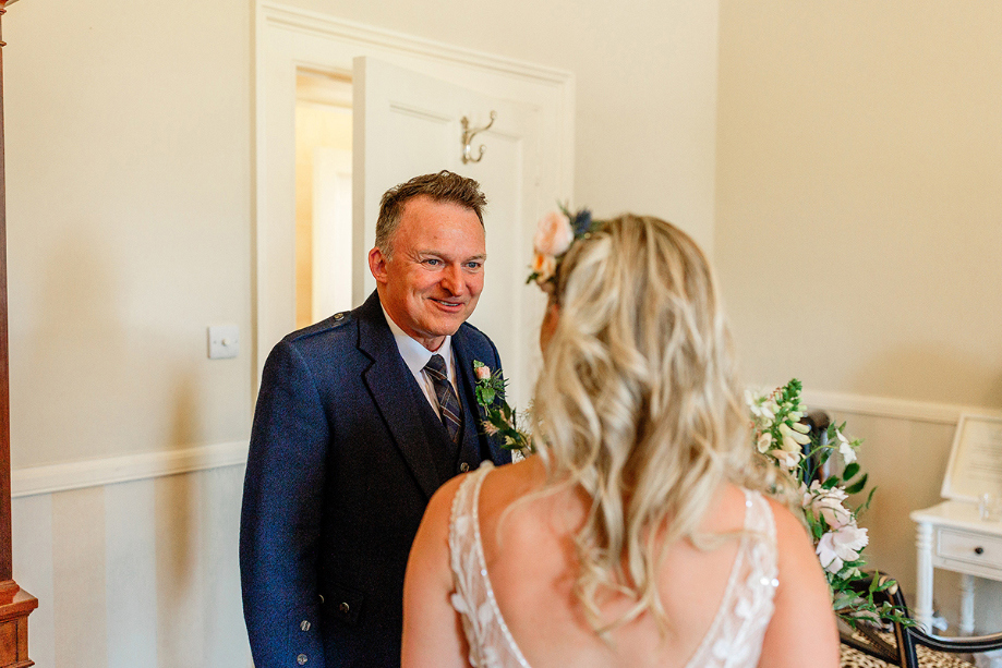 First look with the bride and her father on the wedding morning