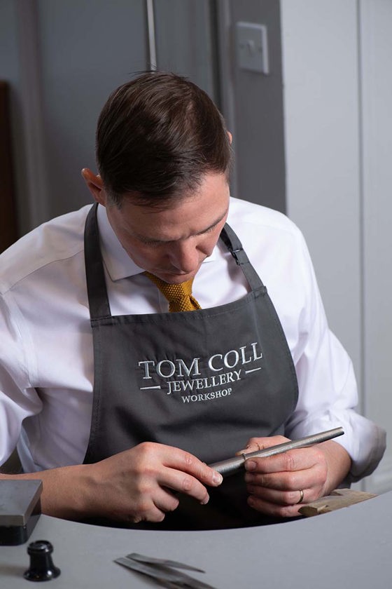 Head of the Tom Coll Jewellery in-house workshop, Michael, working on a piece