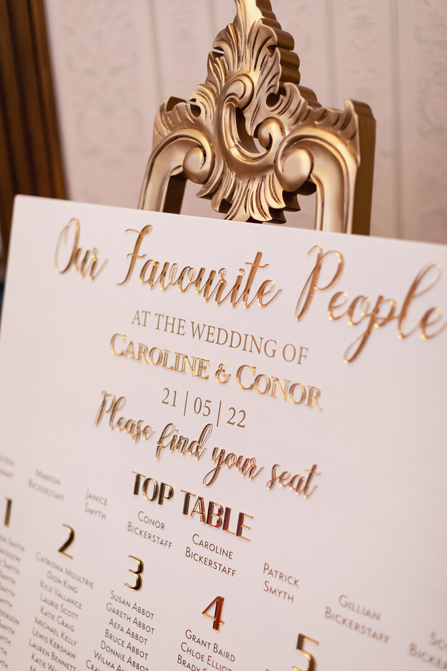 Table plan with gold writing